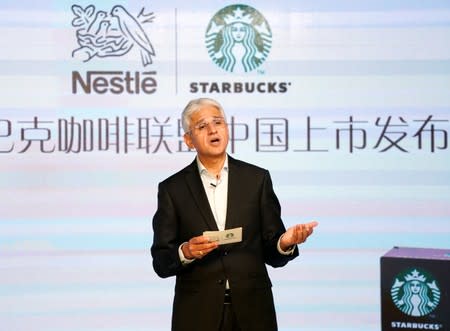 Rashid Aleem Qureshi, Nestle's Greater China region CEO attends a news conference of Nestle start selling Starbucks-branded coffee in China