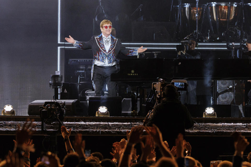 Sir Elton John performs live at the Elton John's final North American show of his "Farewell Yellow Brick Road" tour on Sunday, Nov. 20, 2022, at the Dodger Stadium in Los Angeles. (Photo by Willy Sanjuan/Invision/AP)