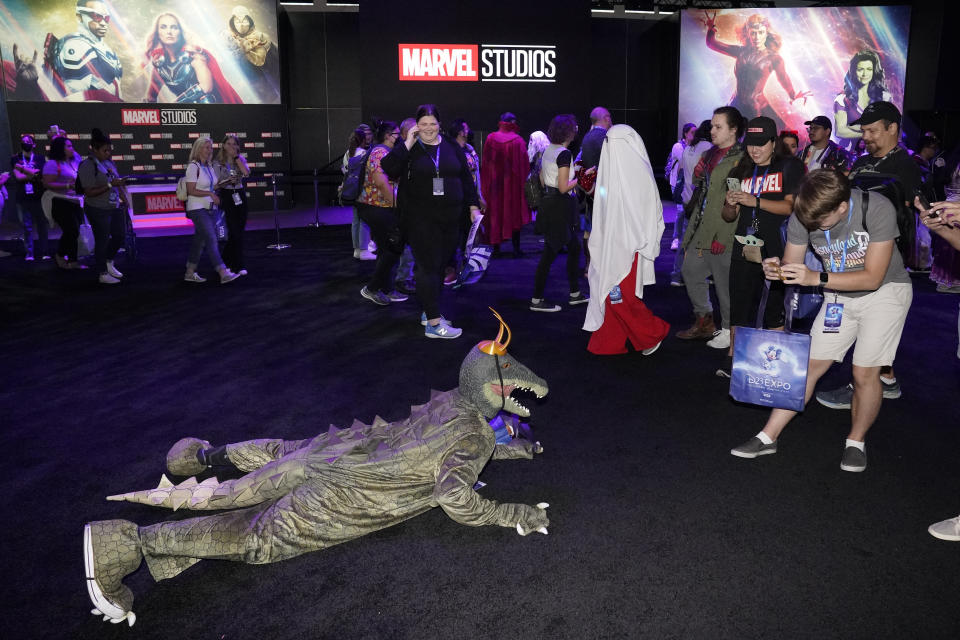 A cosplayer dressed as Alligator Loki poses at the Marvel Exhibit during the D23 Expo Saturday, Sept. 10, 2022, in Anaheim, Calif. (AP Photo/Mark J. Terrill)