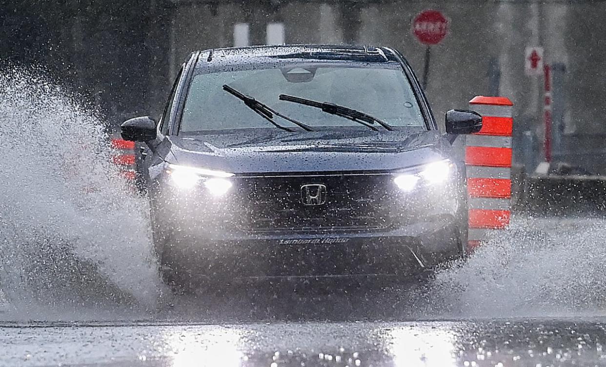 In Montreal, between 40 and 80 millimetres of rain are expected by Thursday evening, with Environment Canada's warning of local flood risks. (Graham Hughes/The Canadian Press - image credit)