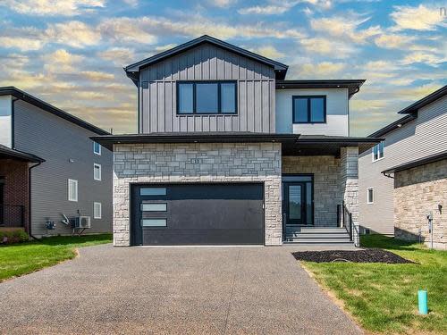 This home in Bedford, Nova Scotia is listed by Royal LePage for $964,900. It features 3,241 square feet, including five bedrooms and four bathrooms. 