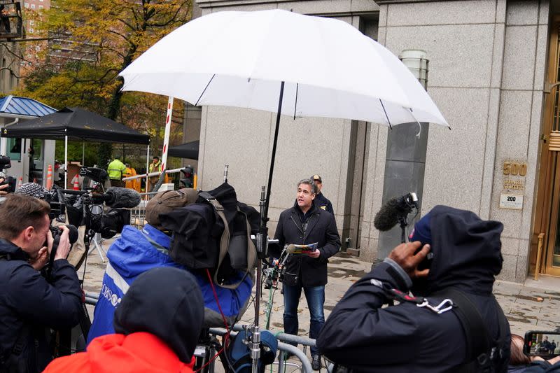 Michael Cohen leaves court in New York