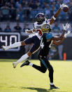 <p>Jacksonville Jaguars wide receiver Keelan Cole (84) makes a catch for a 32-yard gain in front of Houston Texans cornerback Kevin Johnson during the first half of an NFL football game, Sunday, Dec. 17, 2017, in Jacksonville, Fla. (AP Photo/Stephen B. Morton) </p>