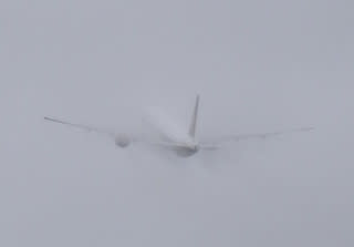 Plane in the rain