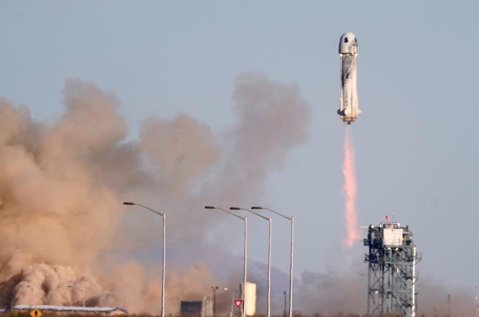 Blue Origin's New Shepard rocket launches from its spaceport near Van Horn, Texas, Saturday, Dec. 11, 2021. (AP Photo/LM Otero)
