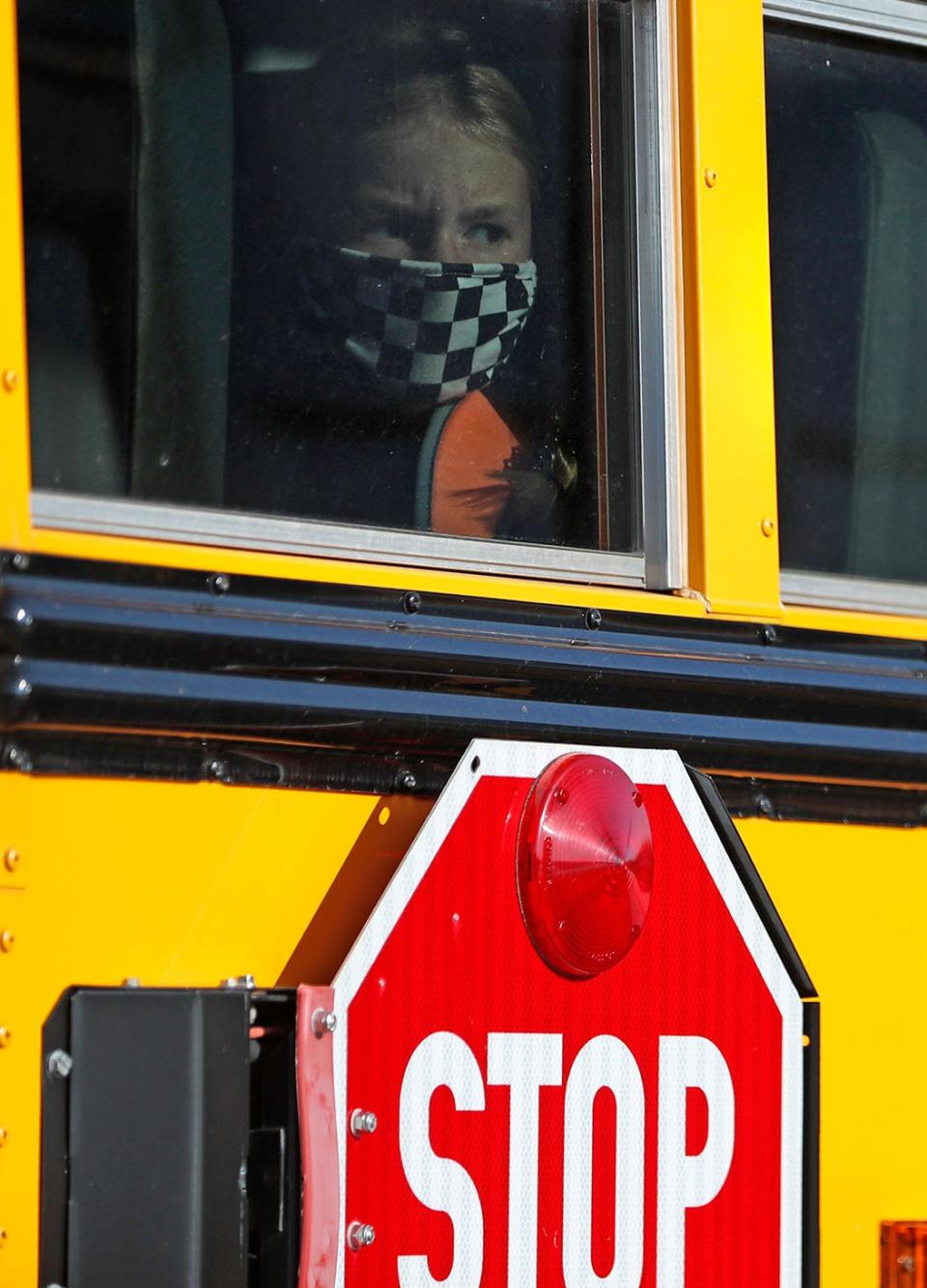 Kids arrive for the first day of the 2021/22 school year Wednesday, Aug. 4, 2021 at HSE Intermediate & Junior High School.