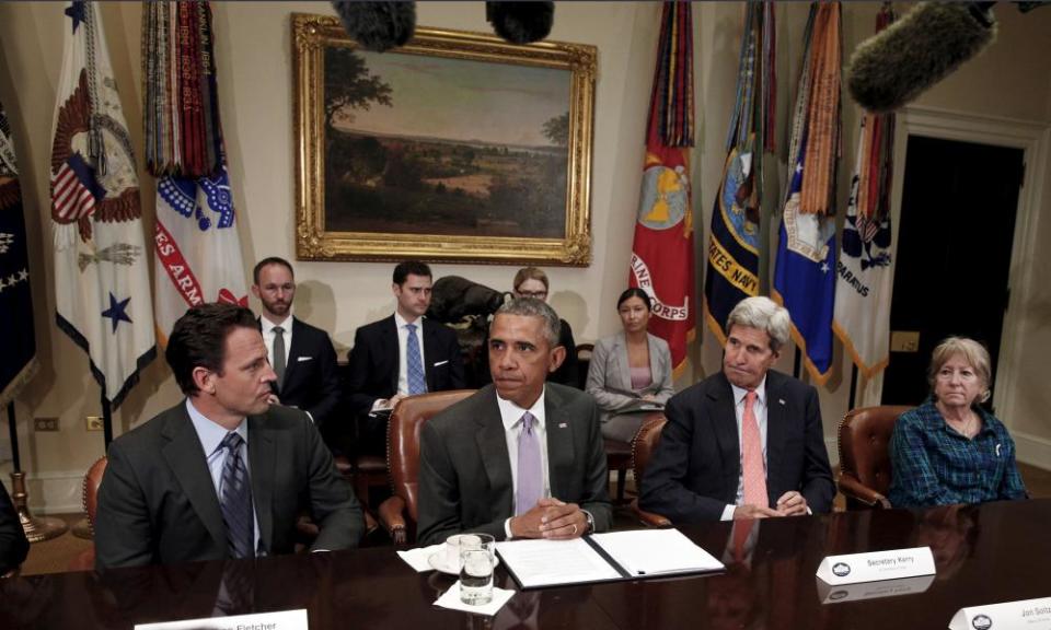 Michelle DeFord sits alongside President Barack Obama and the then secretary of state John Kerry at a White House meeting in 2015.