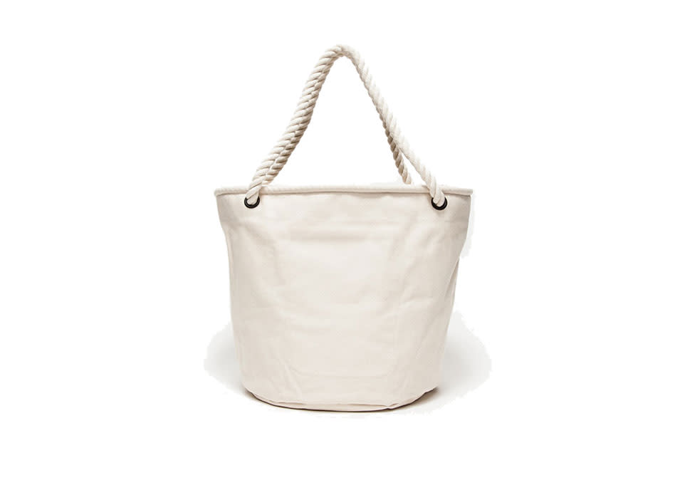 <p>All Hands Bag, $240, <a rel="nofollow noopener" href="http://needsupply.com/womens/bags/totes/canvas-sailor-bag.html%20" target="_blank" data-ylk="slk:needsupply.com;elm:context_link;itc:0;sec:content-canvas" class="link ">needsupply.com </a></p>