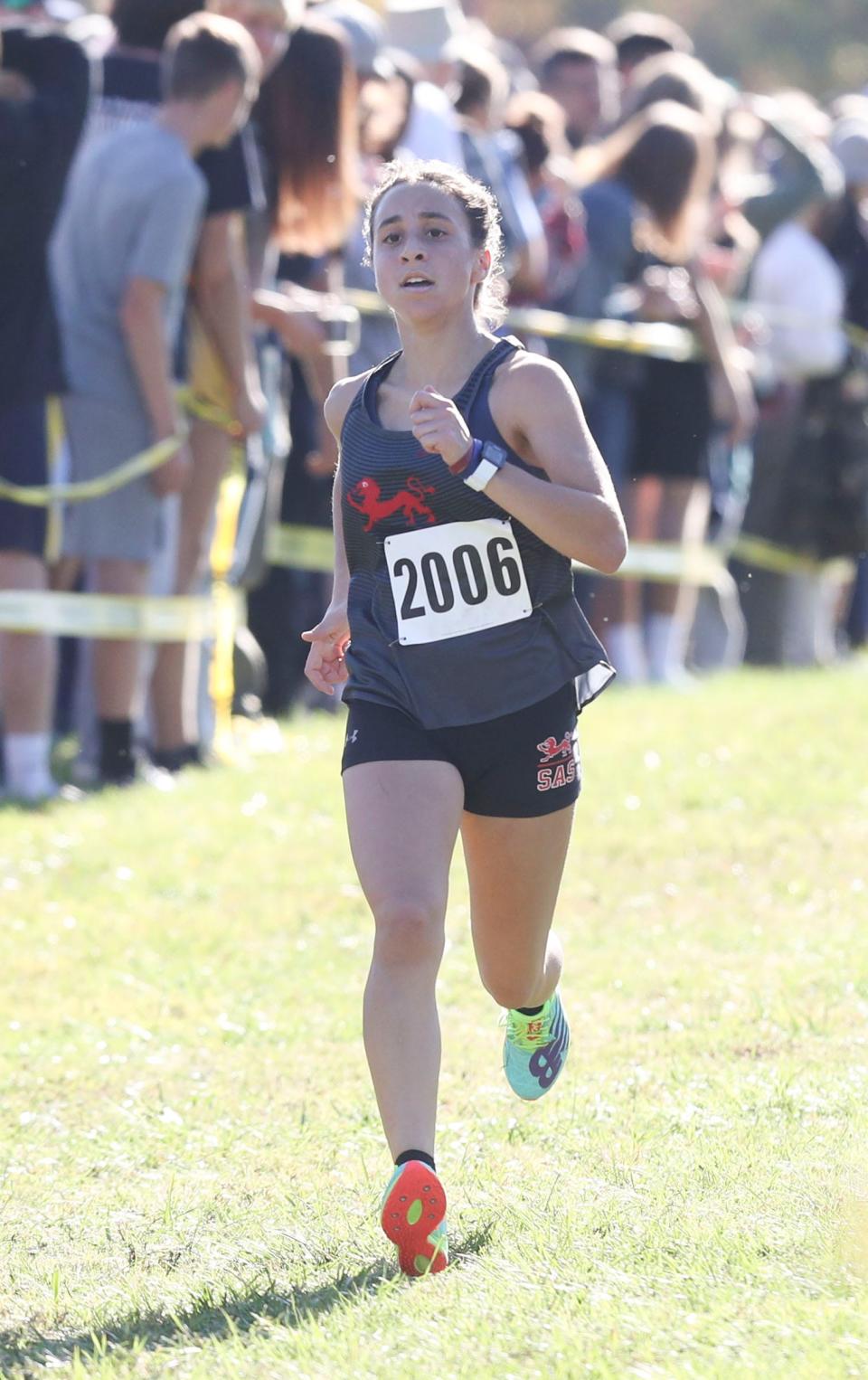 Leah Horgan, shown here earlier this season, helped St. Andrew's to its first girls team championship at the New Castle County cross country meet on Saturday at Winterthur.