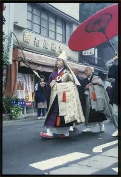 Shinto priests in purification ceremony/festival in Yokohama.