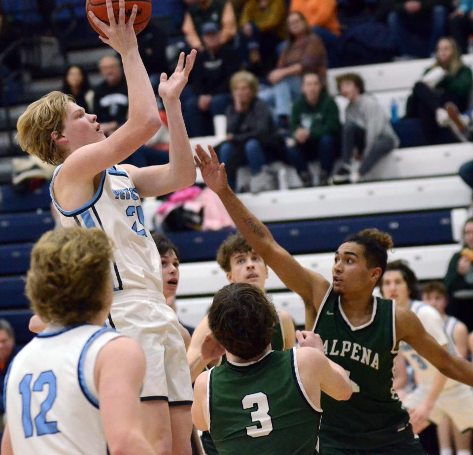 Petoskey's Cade Trudeau pulls up over the Alpena defense for a score during the second half of Friday's game.