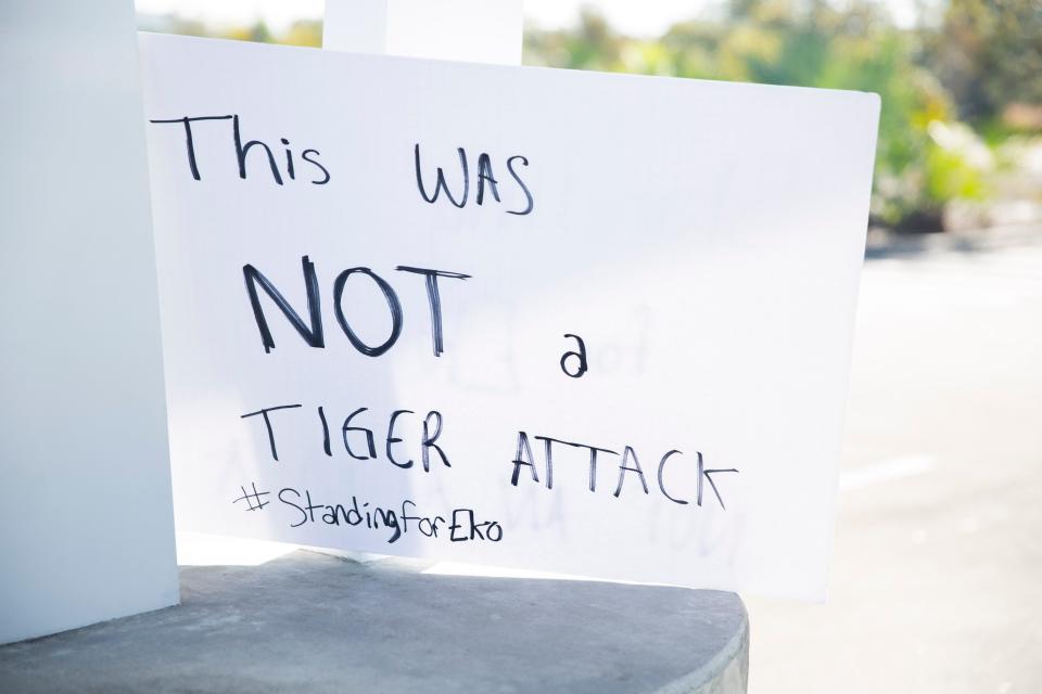 A sign that states "This was NOT a tiger attack. #StandingforEko" left in the parking lot of the Naples Zoo at Caribbean Gardens on Thursday, Dec. 30, 2021 in Naples, Fla. 