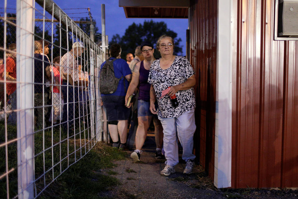 People arrive to receive care