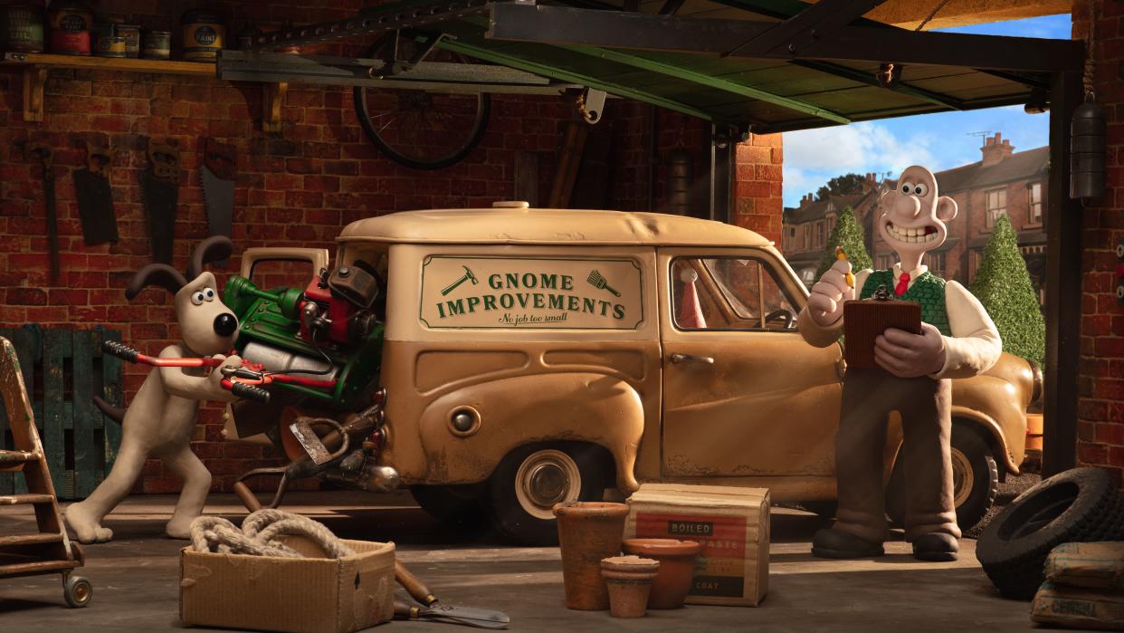  Wallace & Gromit standing next to their "Gnome Improvements" van in "Wallace & Gromit: Vengeance Most Fowl". 