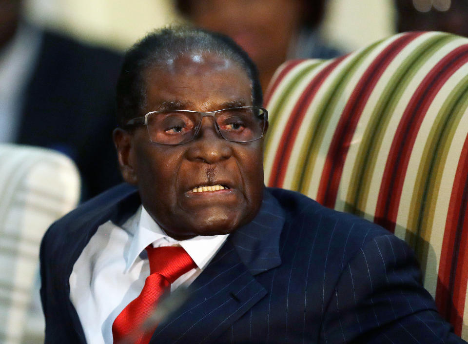 FILE - In this Oct. 3, 2017 file photo, Zimbabwean President Robert Mugabe during a meeting with South African President Jacob Zuma at the Presidential Guesthouse in Pretoria, South Africa. On Friday, Sept. 6, 2019, Zimbabwe President Emmerson Mnangagwa said his predecessor Robert Mugabe, age 95, has died. (AP Photo/Themba Hadebe, FILE)