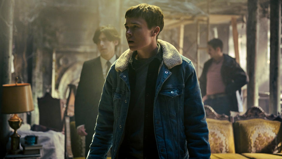 Viktor, Five, and Diego inspect their rundown home in The Umbrella Academy season 4