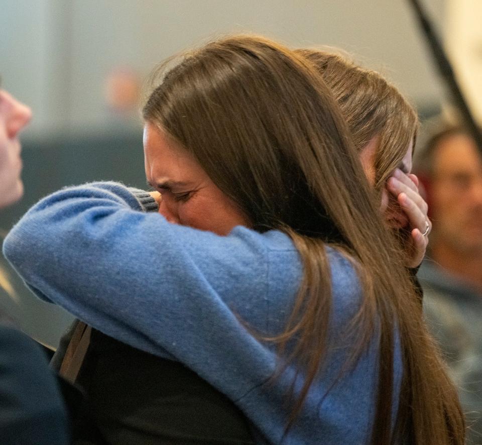 Caitlin Cash, right, is embraced during the first day of trial during the first day of Kaitlin Armstrong’s trial at the ... (AP)