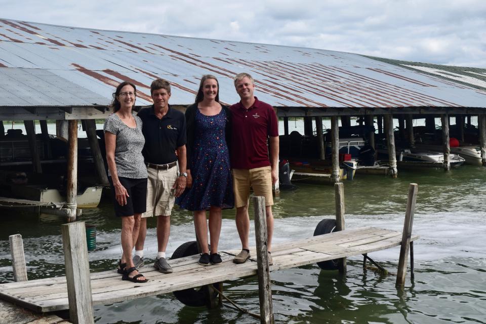 Pictured (from left to right) are Cheryl Blomberg, Wayne Blomberg, Lynne Pearson and Daniel Pearson on the Ryde Marine's dock on the shore of Crooked Lake on Tuesday, July 26.