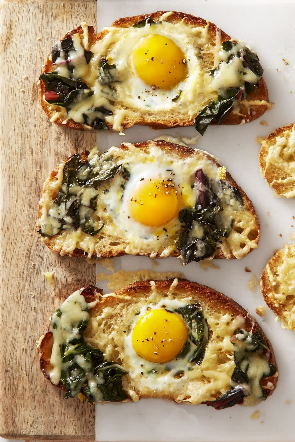 <p>Egg in a hole is one of our favorite, kid-friendly breakfasts. Make it an even more balanced meal with dark, leafy chard (or other greens) and a sprinkle of Gruyère. </p><p>Get the <a href="https://www.goodhousekeeping.com/food-recipes/a43666/chard-gruyere-eggs-in-the-hole-recipe/" rel="nofollow noopener" target="_blank" data-ylk="slk:Chard and Gruyère Eggs in the Hole recipe;elm:context_link;itc:0;sec:content-canvas" class="link "><strong>Chard and Gruyère Eggs in the Hole recipe</strong></a><em>.</em></p>