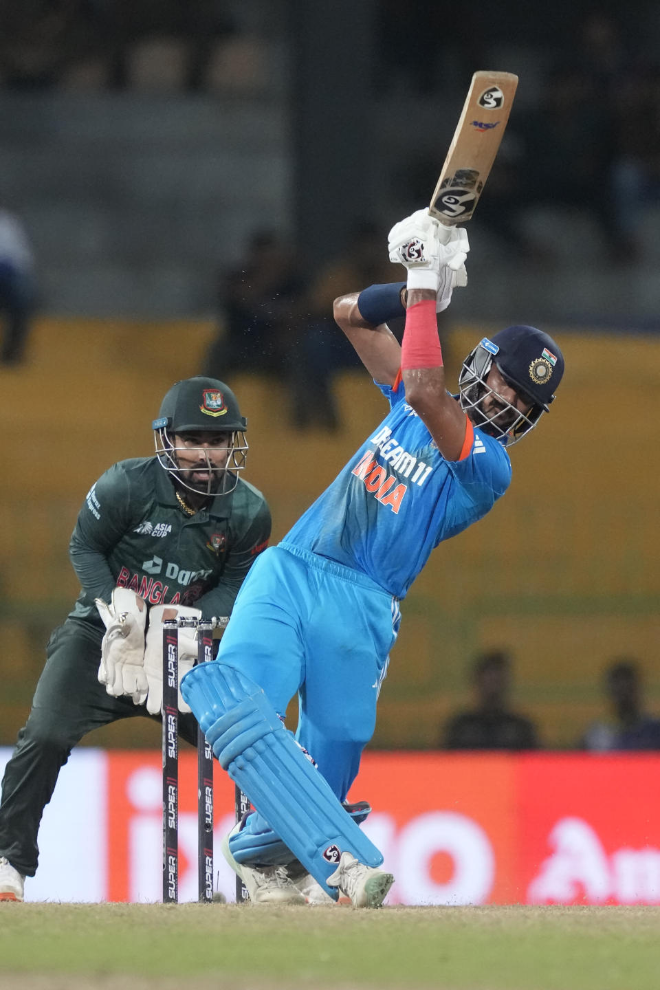 India's Axar Patel plays a shot during the Asia Cup cricket match between Bangladesh and India in Colombo, Sri Lanka, Friday, Sept.15, 2023. (AP Photo/Eranga Jayawardena)