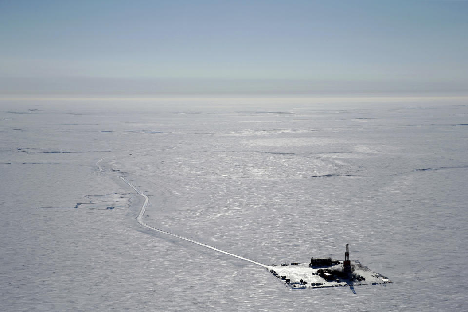 FILE - This 2019 aerial photo provided by ConocoPhillips shows an exploratory drilling camp at the proposed site of the Willow oil project on Alaska's North Slope. Alaska's push to become a bigger player in the clean energy market is in the spotlight this week at a conference convened by Republican Gov. Mike Dunleavy, even as the state continues to embrace new fossil fuel production, including the controversial Willow oil project. (ConocoPhillips via AP, File)