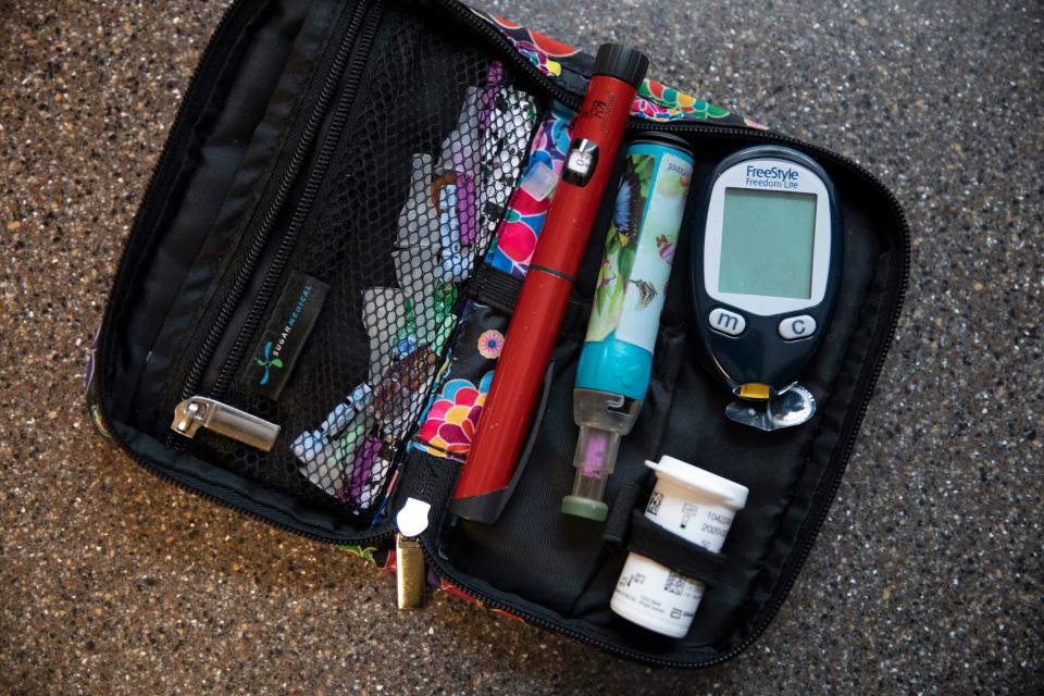 Diedre Waxman's diabetes bag includes the pen she loads with cartridges to administer her insulin.