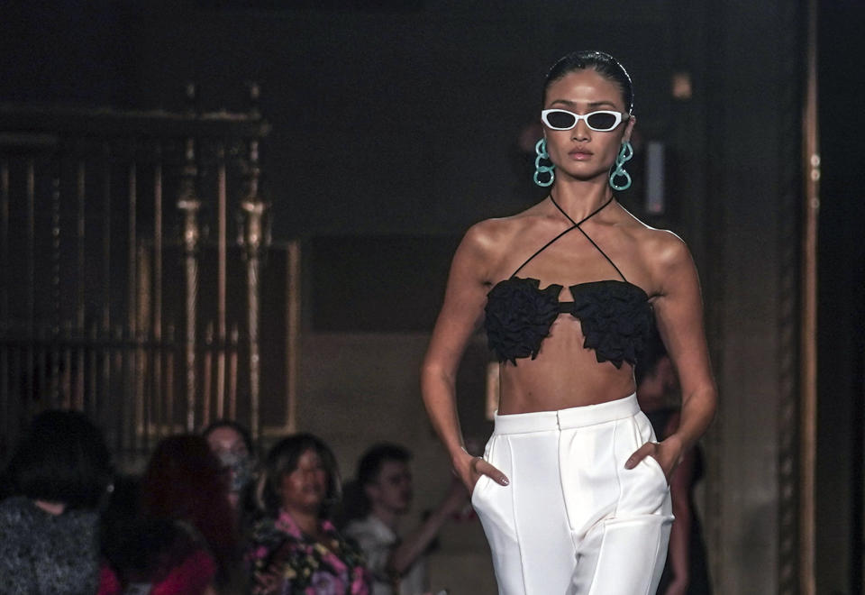 The latest fashion from Christian Siriano is modeled during New York's Fashion Week, Tuesday, Sept. 7, 2021. (AP Photo/Bebeto Matthews)