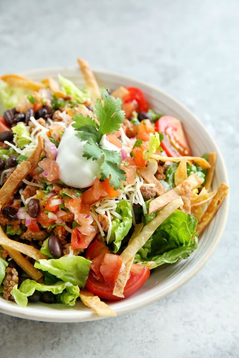 <p>Try a healthier twist on Taco Tuesdays.<br><br>Get the recipe from <a href="https://www.delish.com/cooking/recipe-ideas/recipes/a48351/beef-taco-salad-recipe/" rel="nofollow noopener" target="_blank" data-ylk="slk:Delish;elm:context_link;itc:0;sec:content-canvas" class="link ">Delish</a>.</p>