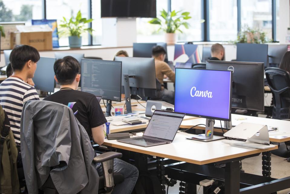 Employees work at the Canva Inc. headquarters in Sydney, Australia, on Wednesday, Sept. 14, 2022. Australian design software company Canva's platform has gained popularity among smaller companies and Gen Zs since its inception in 2013.