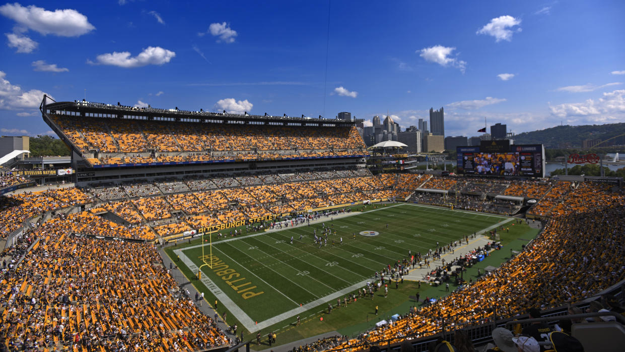 Fans at Acrisure Stadium watch the second half of an NFL football game between the Pittsburgh Steelers and the New England Patriots in Pittsburgh, Sunday, Sept. 18, 2022. (AP Photo/Don Wright)