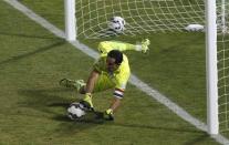 Chile's goalie Claudio Bravo blocks a penalty kick from Argentina's Ever Banega (not shown) during their Copa America 2015 final soccer match at the National Stadium in Santiago, Chile, July 4, 2015. REUTERS/Ueslei Marcelino (TPX IMAGES OF THE DAY) -