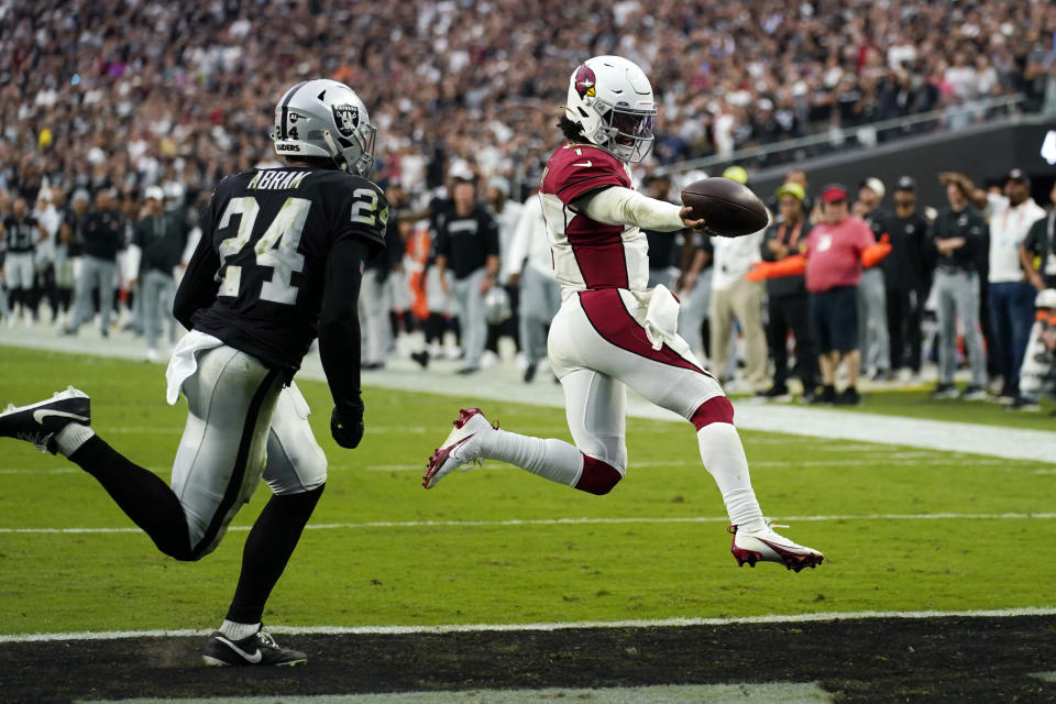 Arizona Cardinals quarterback Kyler Murray runs in for a touchdown as time expires during the fourth quarter of an NFL football game against the Las Vegas Raiders Sunday, Sept. 18, 2022, in Las Vegas. (AP Photo/John Locher)