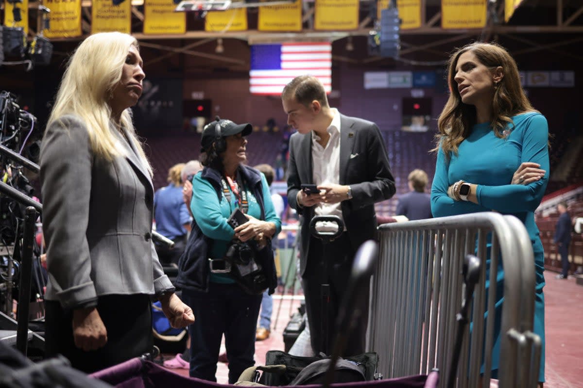 Nancy Mace, right, and Marjorie Taylor Greene, left, are pictured at a Trump campaign event in February 2024 (Getty Images)