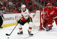 Nov 15, 2017; Detroit, MI, USA; Calgary Flames center Mark Jankowski (77) skates with the puck in the third period against the Detroit Red Wings at Little Caesars Arena. Rick Osentoski-USA TODAY Sports