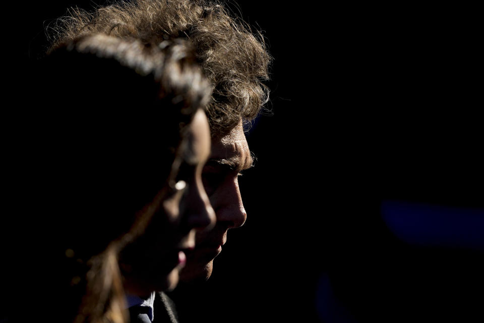 Argentina's President Javier Milei, back, and Vice President Victoria Villarruel attend a ceremony to honor police who lost their lives on duty in Buenos Aires, Argentina, Tuesday, July 2, 2024. (AP Photo/Natacha Pisarenko)