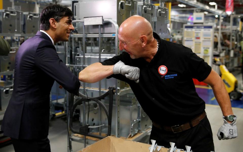 Chancellor of the Exchequer Rishi Sunak greets an employee during his visit to Worcester Bosch factory - Phil Noble /PA