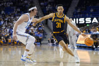UCLA guard Jaime Jaquez Jr. (24) defends against California guard Jordan Shepherd (31) during the first half of an NCAA college basketball game in Los Angeles, Thursday, Jan. 27, 2022. (AP Photo/Ashley Landis)