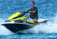 <p>Simon Cowell takes a jet ski for a joyride while on vacation in Barbados on Dec. 23. </p>