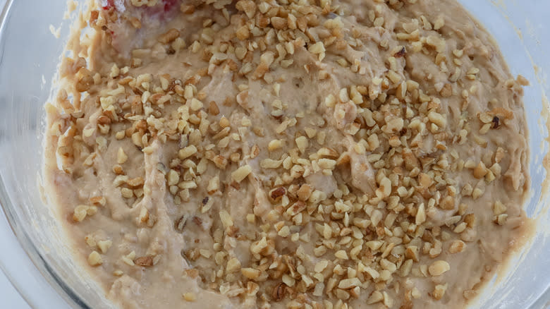 walnut muffin batter in mixing bowl