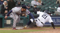 Detroit Tigers left fielder JaCoby Jones (21) slides safely into third base under the tag of Minnesota Twins third baseman Josh Donaldson (20) in the seventh inning of a baseball game in Detroit, Saturday, May 8, 2021. (AP Photo/Paul Sancya)