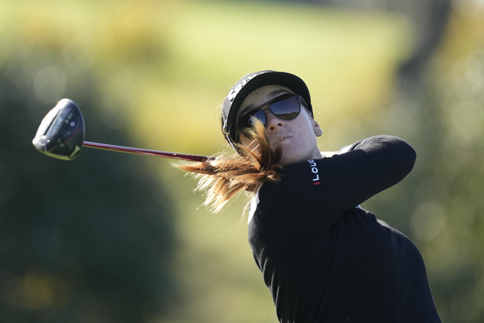 Hannah Green of Australia watches her tee shot on the second hole during the third round of the BMW Ladies Championship at the Seowon Hills Country Club in Paju, South Korea, Saturday, Oct. 21, 2023. (AP Photo/Lee Jin-man)