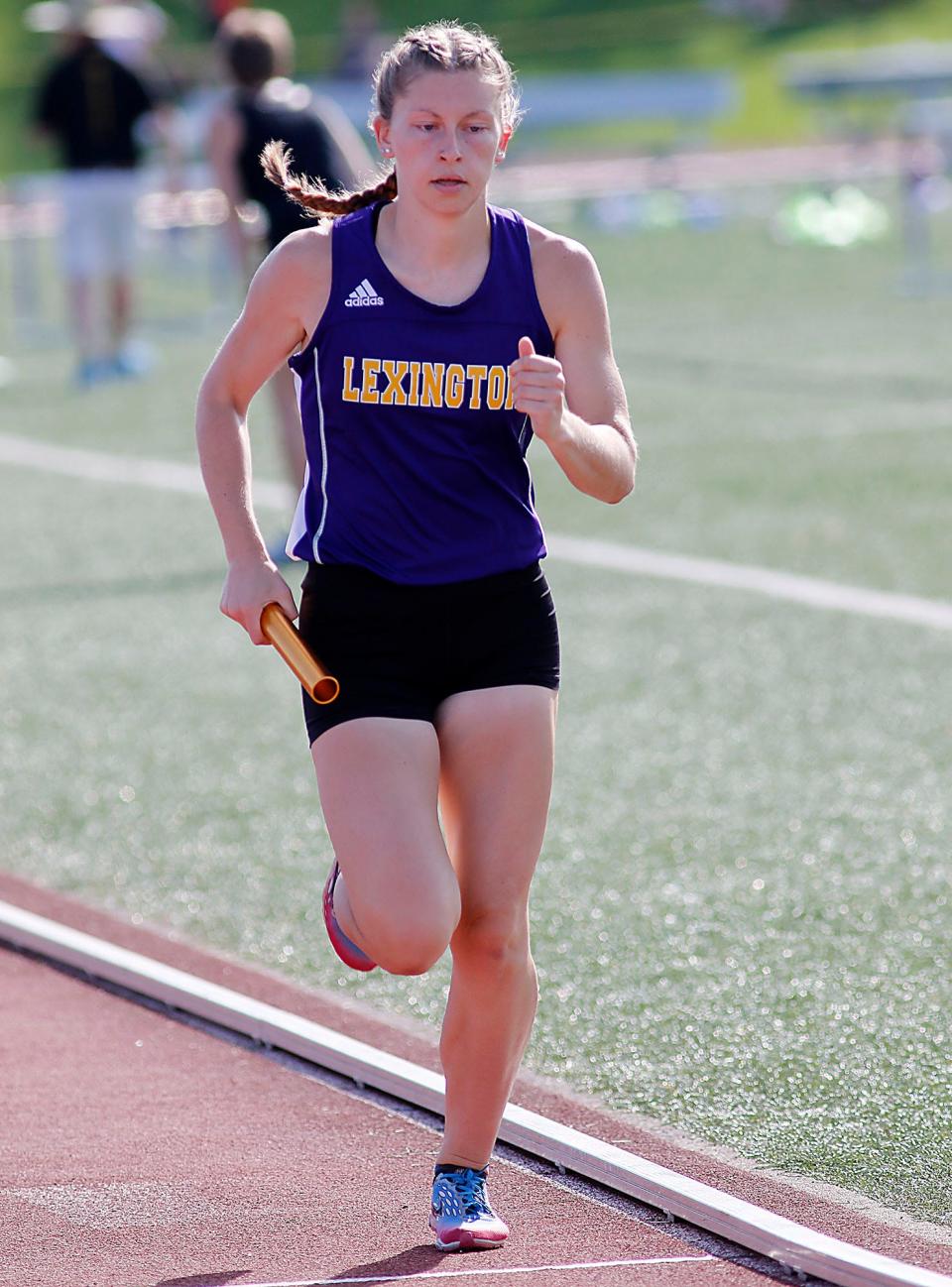 Lexington High School's Karis Hunter competes in the 4x800 meter relay at the Ohio Cardinal Conference track meet held at Ashland University on Friday, May 13, 2022. TOM E. PUSKAR/TIMES-GAZETTE.COM