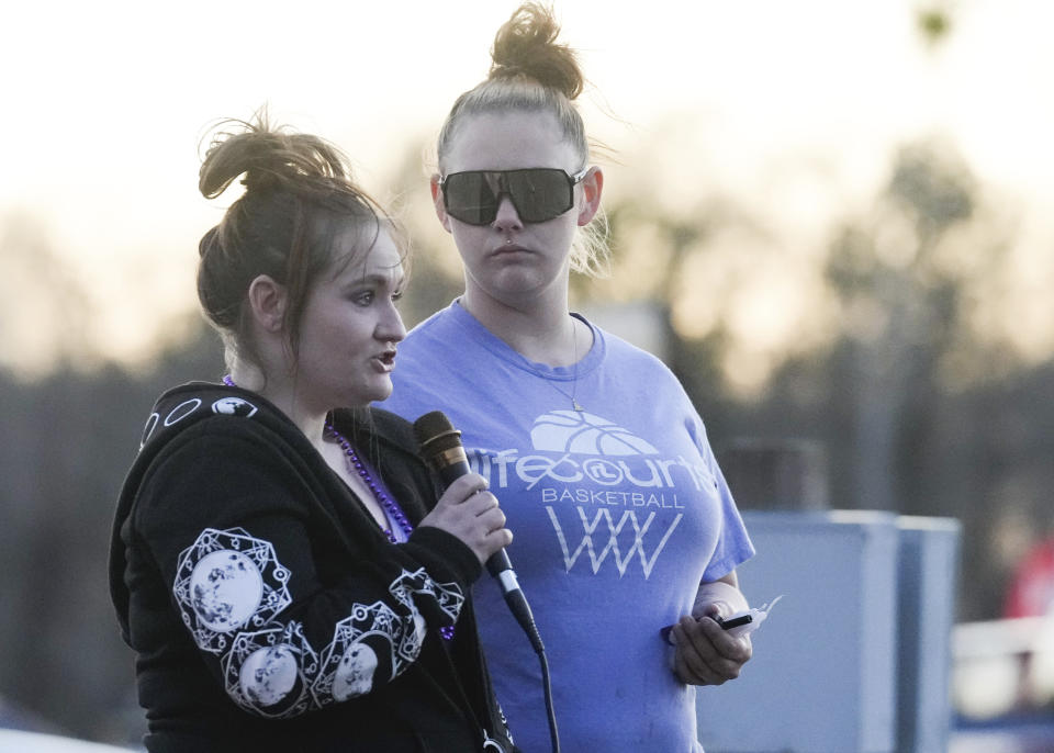 Cassie Matthews speaks at a vigil in honor of her 11-year-old daughter, Audrii Cunningham, Wednesday, Feb. 21, 2024, in Livingston, Texas. Cunningham's family reported her missing Thursday, Feb. 15, when she failed to return to her Livingston home after school. On Tuesday, Feb. 20, search teams found her body in the Trinity River in a rural area north of Houston about 10 miles (16 kilometers) from her home, according to the capital murder criminal complaint filed Tuesday against Don Steven McDougal, a family friend accused of killing the young girl. (Jason Fochtman/Houston Chronicle via AP)