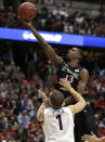 San Diego State forward Winston Shepard (13) drives past Arizona guard Gabe York (1) during the first half in an NCAA men's college basketball tournament regional semifinal, Thursday, March 27, 2014, in Anaheim, Calif. (AP Photo/Jae C. Hong)