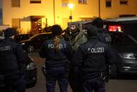 German special forces prepare to search an area after a shooting in Hanau near Frankfurt