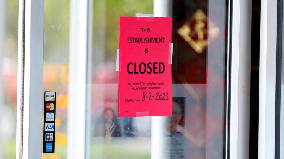 A closed sign placed by the Lexington-Fayette County Health Department on front door of Panda Cuisine at 2358 Nicholasville Rd. #115 in Lexington, Ky. on Monday, Aug. 7, 2023. The popular Asian restaurant was among those shut down temporarily in the last four months.
