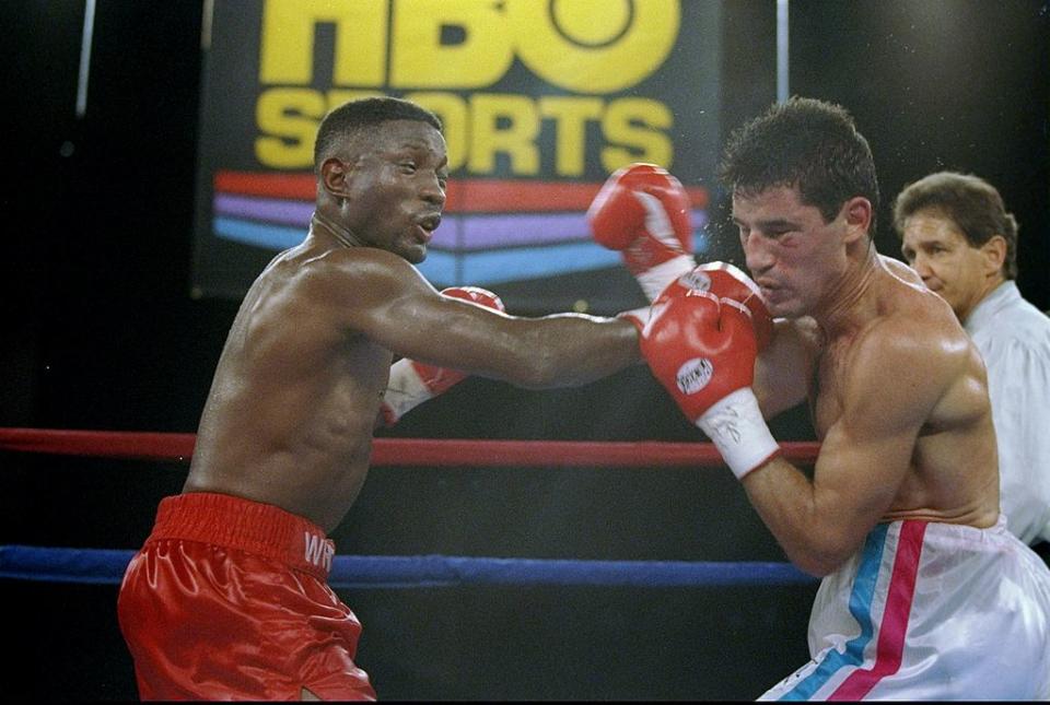 20 Sep 1996: Pernell Whitaker throws a punch at Wilfredo Rivera during a fight at the James L. Knight Center in Miami, Florida. Whitaker won the fight in twelve rounds. Mandatory Credit: Al Bello /Allsport
