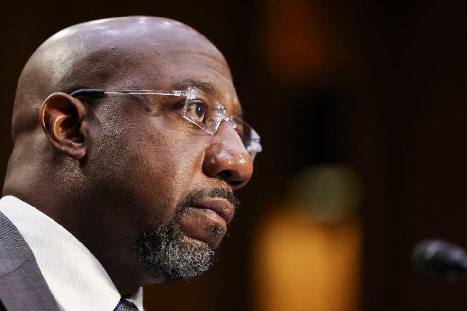 Senator Raphael Warnock (D-GA) testifies during a Senate Judiciary Committee hearing on voting rights on Capitol Hill in Washington,DC on April 20, 2021. (Photo by EVELYN HOCKSTEIN / POOL / AFP) (Photo by EVELYN HOCKSTEIN/POOL/AFP via Getty Images)