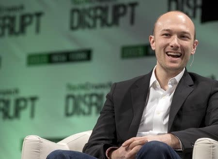 Logan Green, co-founder and CEO of Lyft, speaks during the TechCrunch Disrupt event in New York May 5, 2015. REUTERS/Brendan McDermid