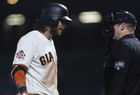 May 17, 2018; San Francisco, CA, USA; San Francisco Giants shortstop Brandon Crawford (35) reacts after a call third strike during the twelfth inning against the Colorado Rockies at AT&T Park. Mandatory Credit: Neville E. Guard-USA TODAY Sports